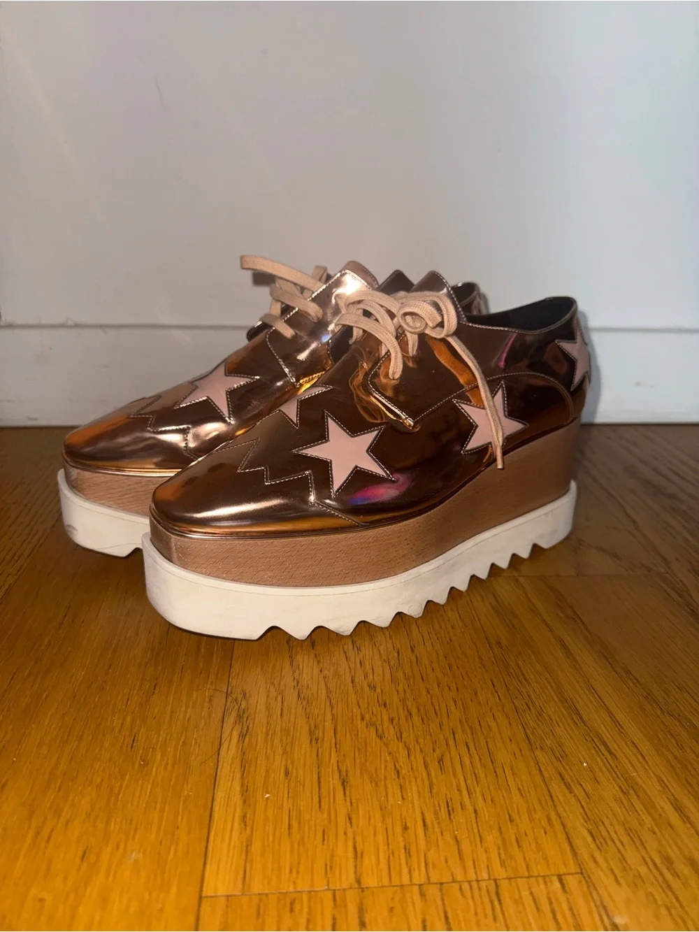 Stella McCartney Metallic Rose Gold Platform Lace-Up Sneakers with Pink Stars